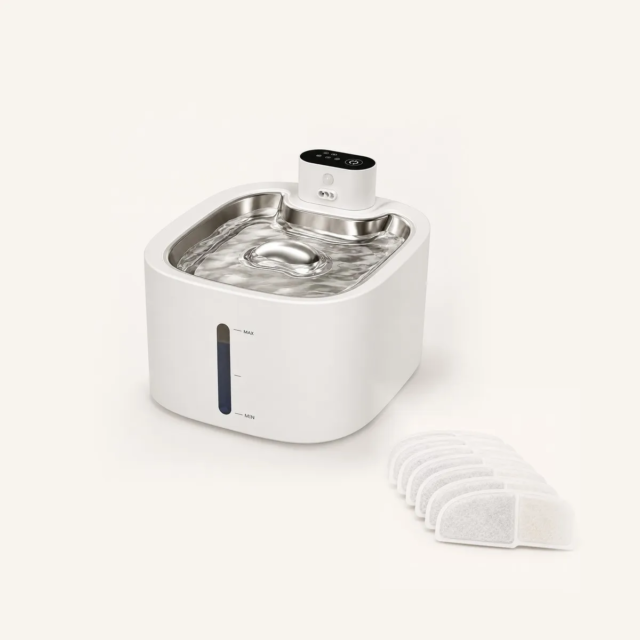 White SHAEVRA Flow cat water fountain beside a 7-pack of replacement filters
